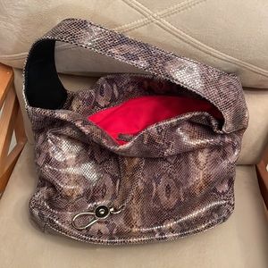 Brand new Dooney and Bourke snake embossed design leather hobo bag